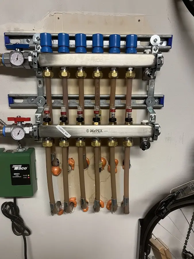 Plumber performing Gas Line Installation at a residential property in Casco